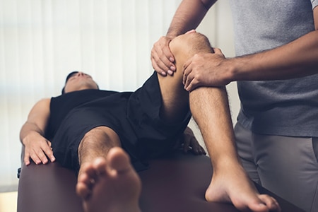 Injured athlete sports therapy treatment